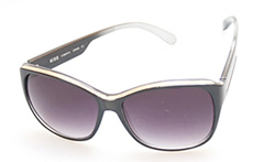 Enkel solbrille i cateye design med metallook øverst 
