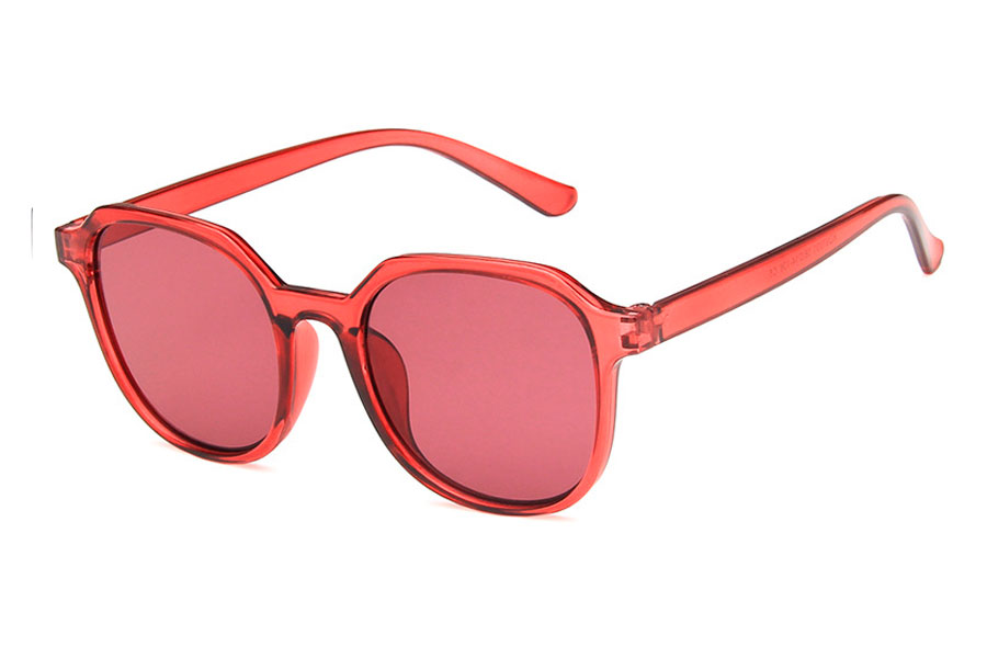 Dame solbrille i mÃ¸rk pink transparent stel med rÃ¸delige glas